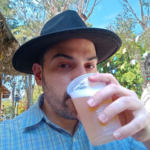 Myself using a black hat and drinking a beer